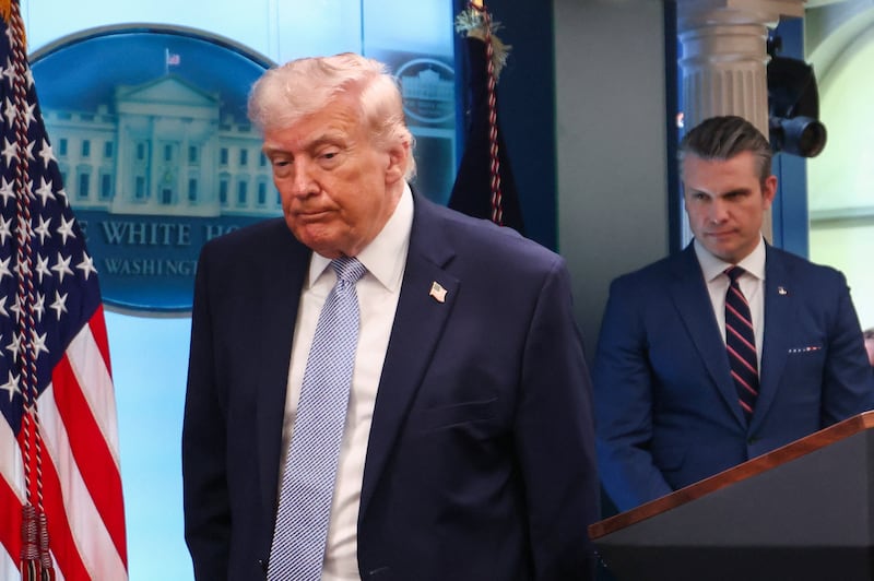 U.S. President Donald Trump and Secretary of Defense Pete Hegseth leave following a press conference in the James S. Brady Press Briefing Room at the White House in Washington, D.C., U.S., April 6, 2026. REUTERS/Kevin Lamarque