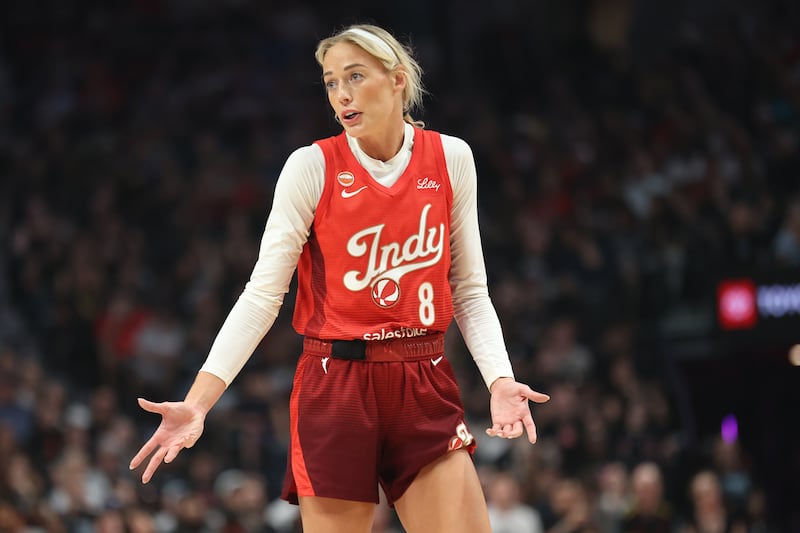 Indiana Fever guard Sophie Cunningham reacts to game play against the Portland Fire during the first half at Moda Center.