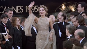 US actress Sharon Stone waves to the crowd before the closing ceremony of the 48th Cannes Film Festival in Cannes, southern France, on May 28, 1995