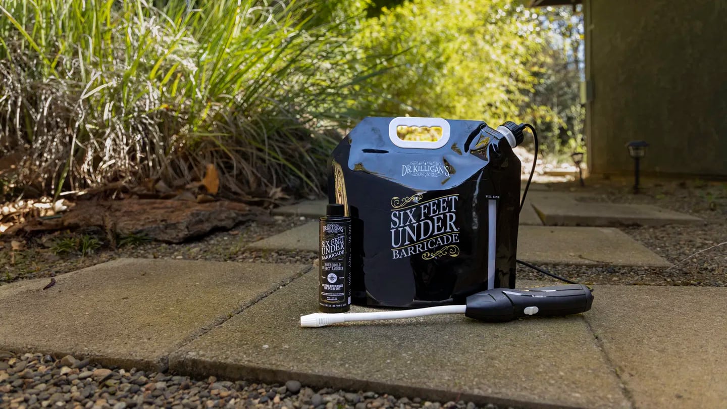 Dr. Killigan’s Eco-Friendly Outdoor DIY Pest Control Kit on Outdoor Walkway