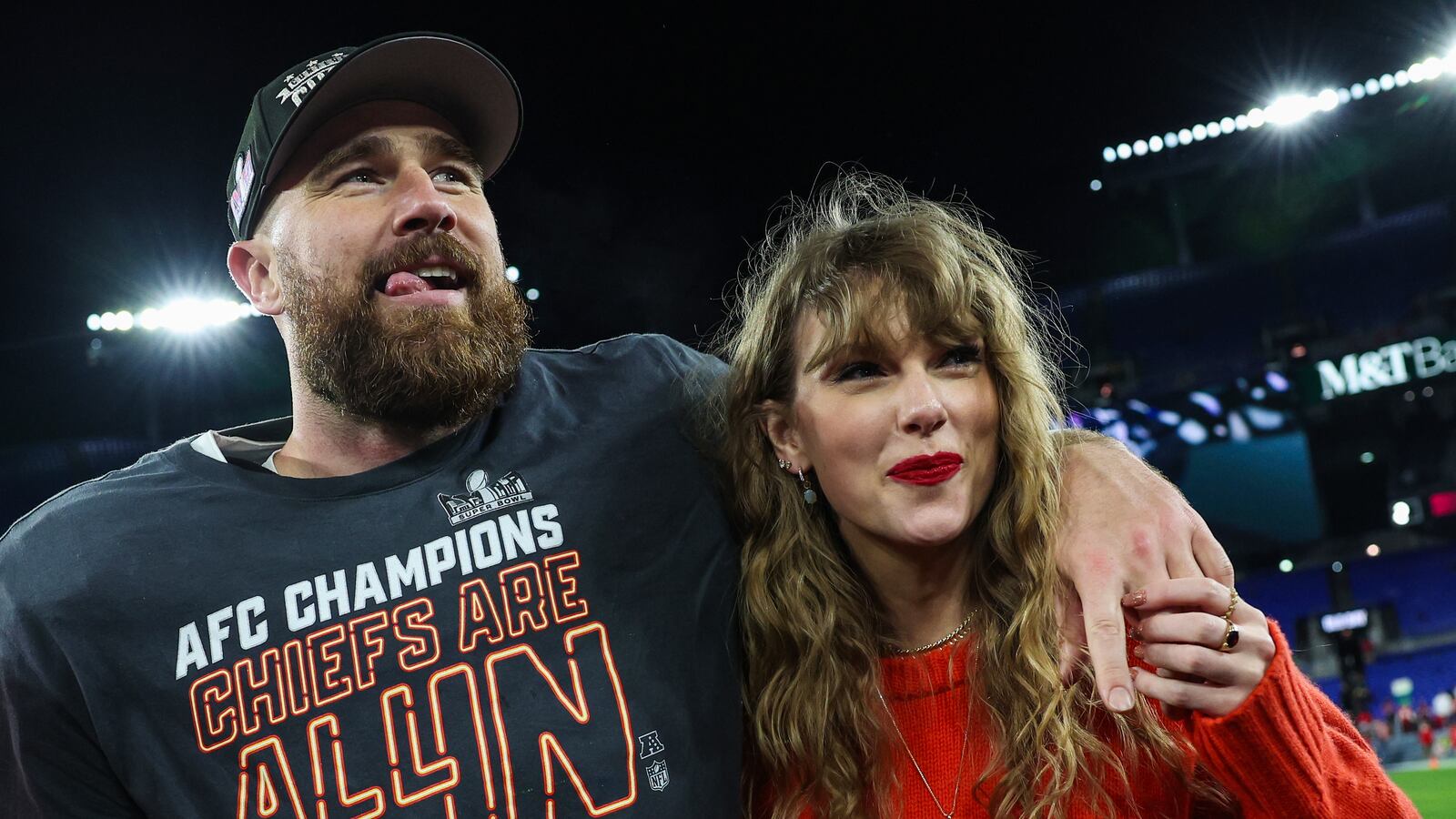Travis Kelce of the Kansas City Chiefs celebrates with Taylor Swift
