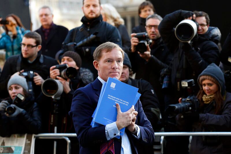 articles/2012/12/01/against-government-regulation-for-british-tabloids/leveson-tabloids-moynihan_t6dhk1