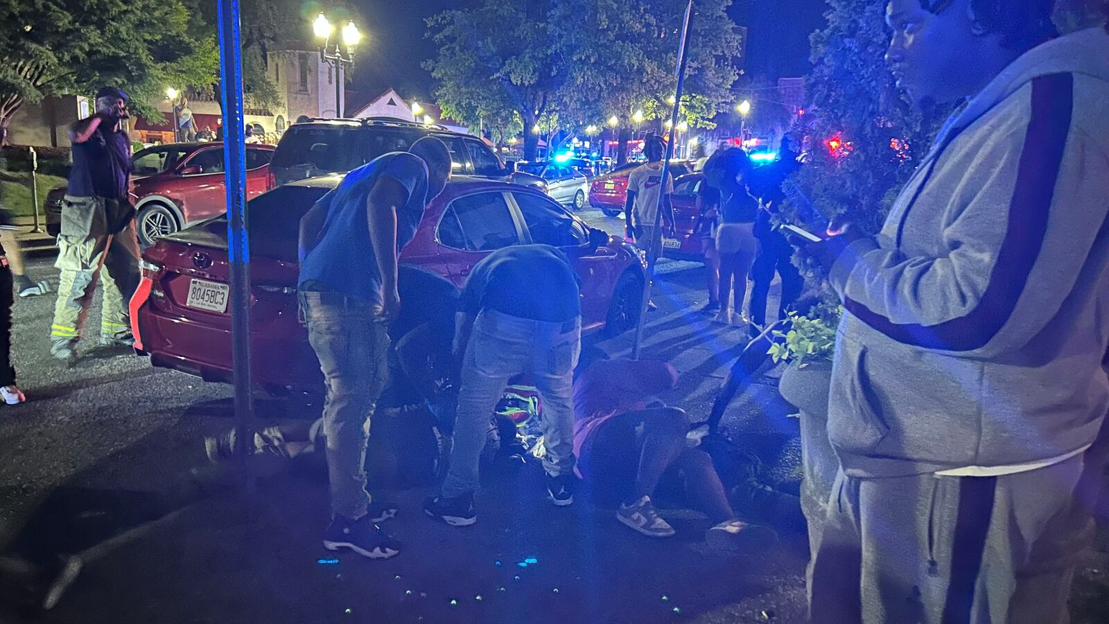 Victims lie on the ground as police respond to a deadly mass shooting where many were also wounded outside a nightclub in Birmingham, Alabama.