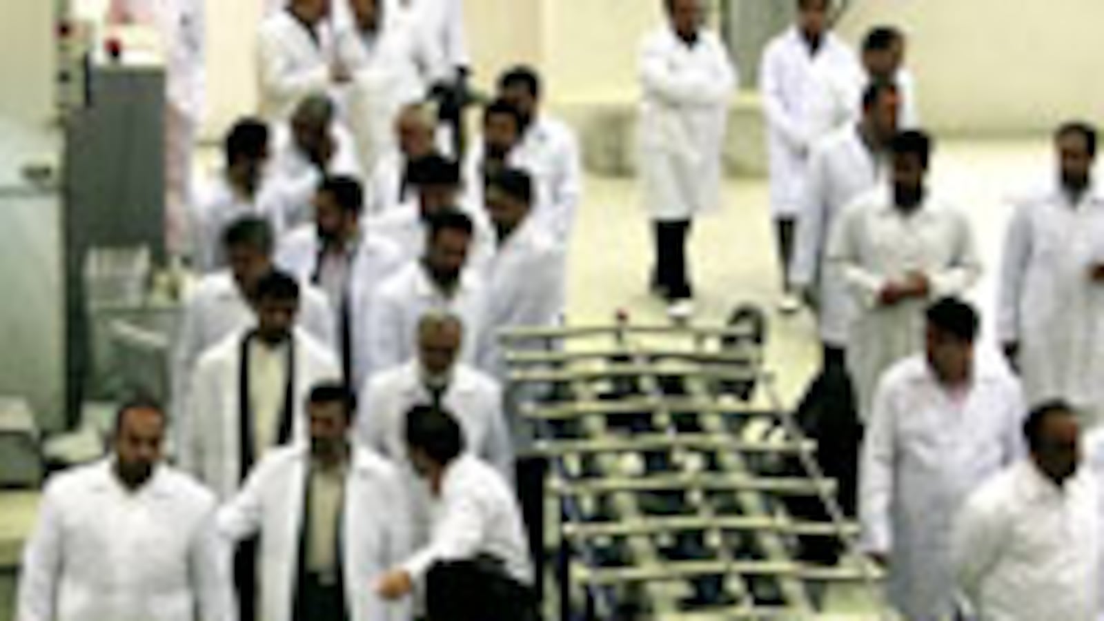 articles/2009/10/30/why-iran-loves-ambiguity/adler---ahmadinejad-visits-iran-uranium-plant_59695_itie14