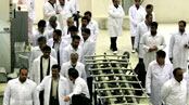articles/2009/10/30/why-iran-loves-ambiguity/adler---ahmadinejad-visits-iran-uranium-plant_59695_itie14