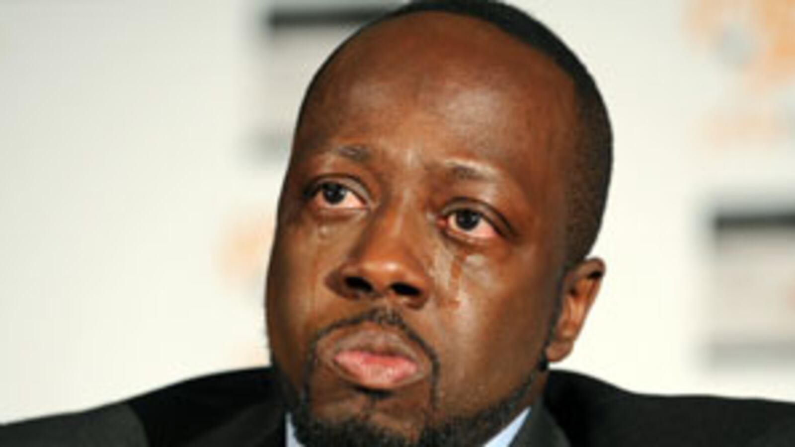 cheats/2010/01/23/wyclef-revamps-charity/wyclef-revamps-charity_vkhtzg