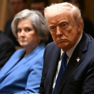 President Donald Trump, pictured with Chief of Staff Susan Wiles in March, defended her as "fantastic" despite her unfiltered observations to Vanity Fair.