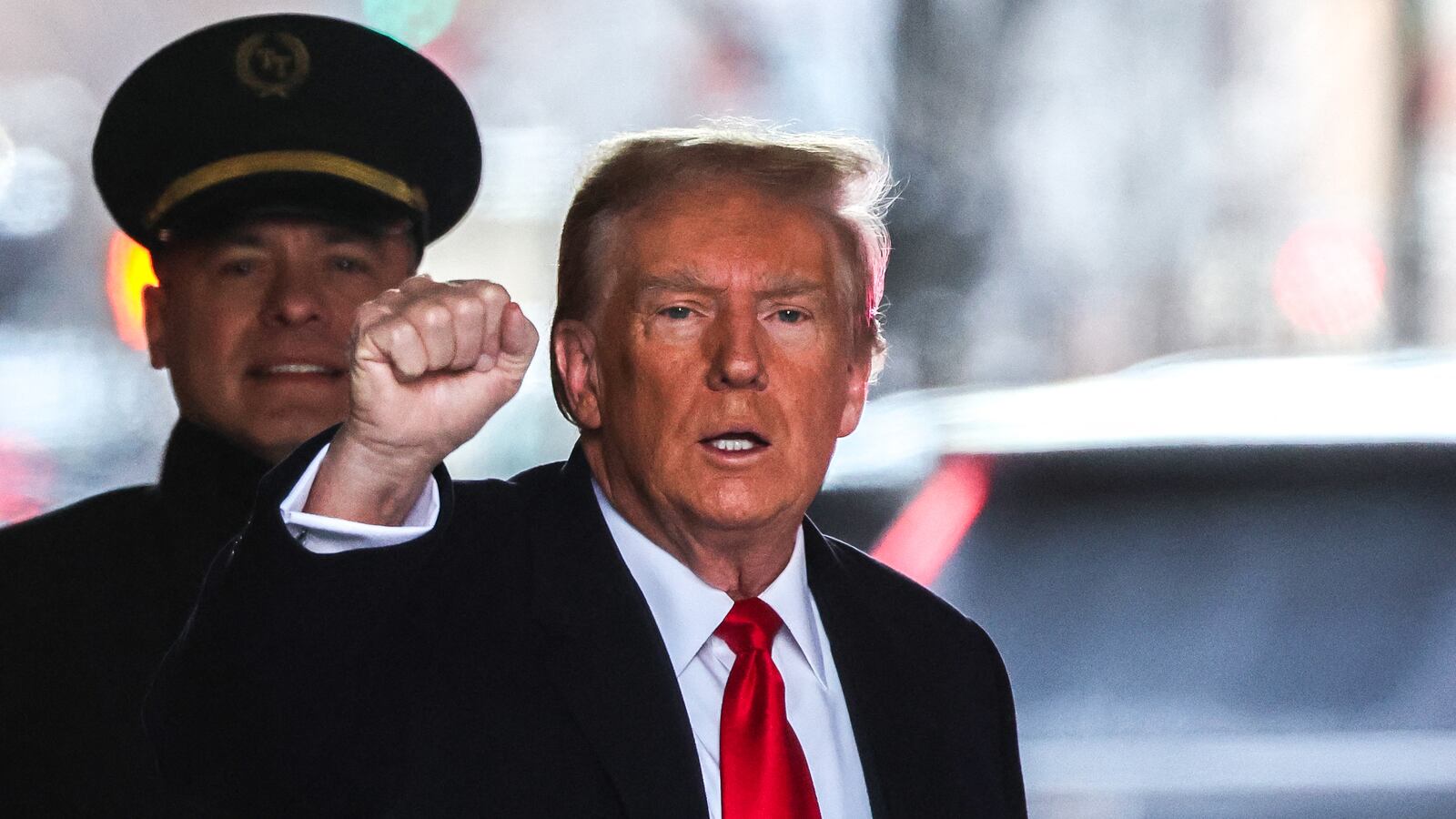 Former US President Donald Trump leaves Trump Tower for Manhattan federal court for the second defamation trial against him, in New York City on January 17, 2024.