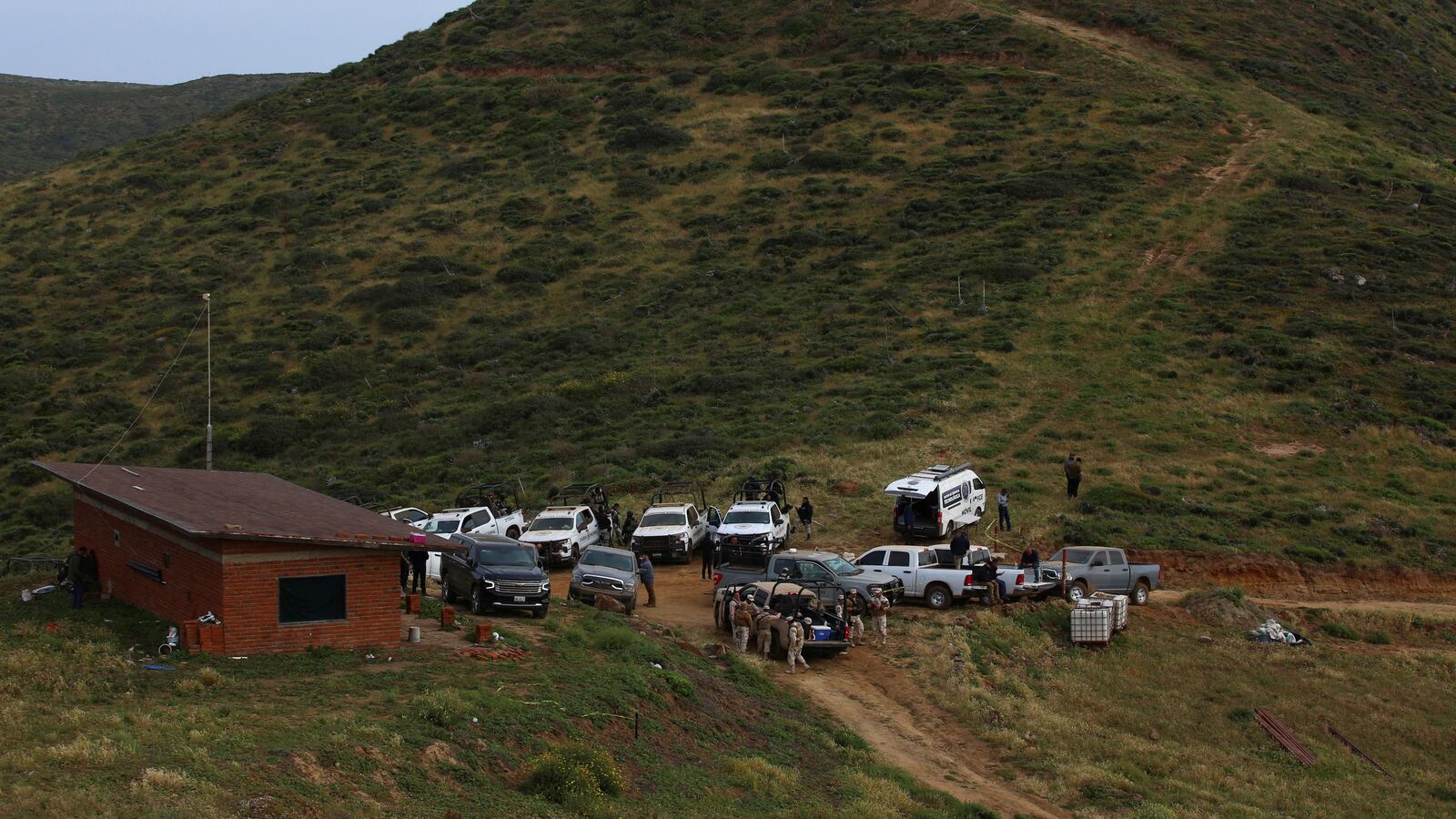 Authorities descend upon the site where the bodies of three tourists, two Australians and one American, were believed to be found.