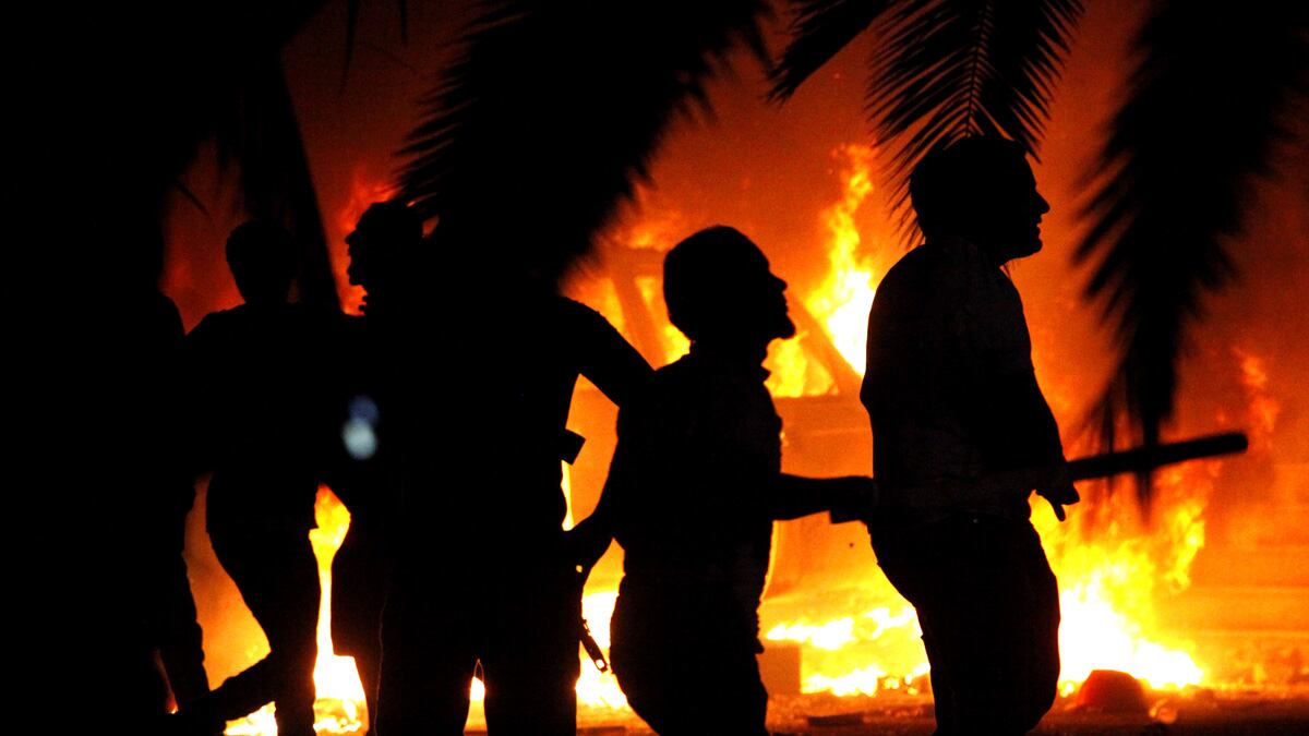 cheats/2012/09/22/libyans-storm-militia-headquarters/militia-protests-libya-cheat_hgri98