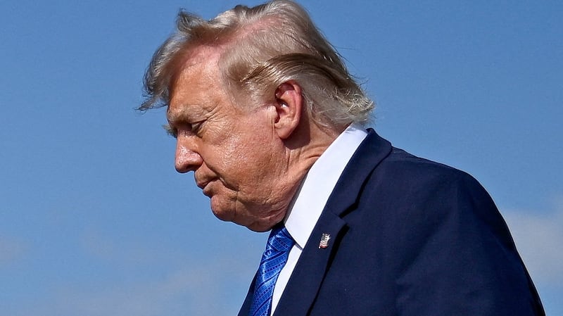 U.S. President Donald Trump gives thumbs-up as he walks to board Marine One following his arrival aboard Air Force One at Morristown Municipal Airport in Morristown, New Jersey, U.S., July 31, 2026.
