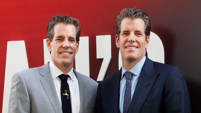 Cameron Winklevoss (L) and Tyler Winklevoss pose as they arrive at the world premiere of the film "Ocean's 8" at Alice Tully Hall in New York City, New York, U.S., June 5, 2018. REUTERS/Mike Segar