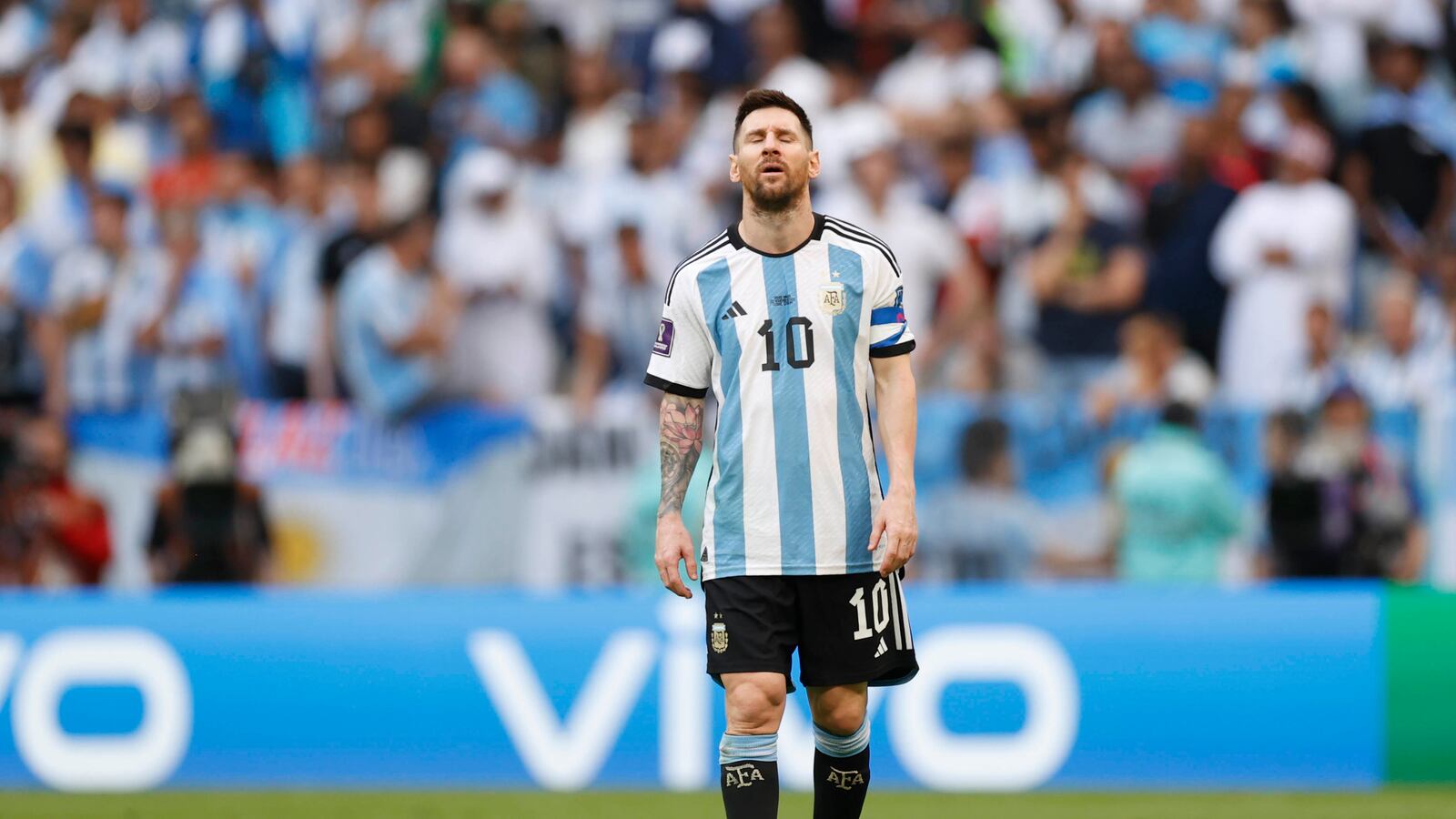 Argentina forward Lionel Messi (10) reacts after losing to Saudi Arabia during a group stage match during the 2022 World Cup at Lusail Stadium.