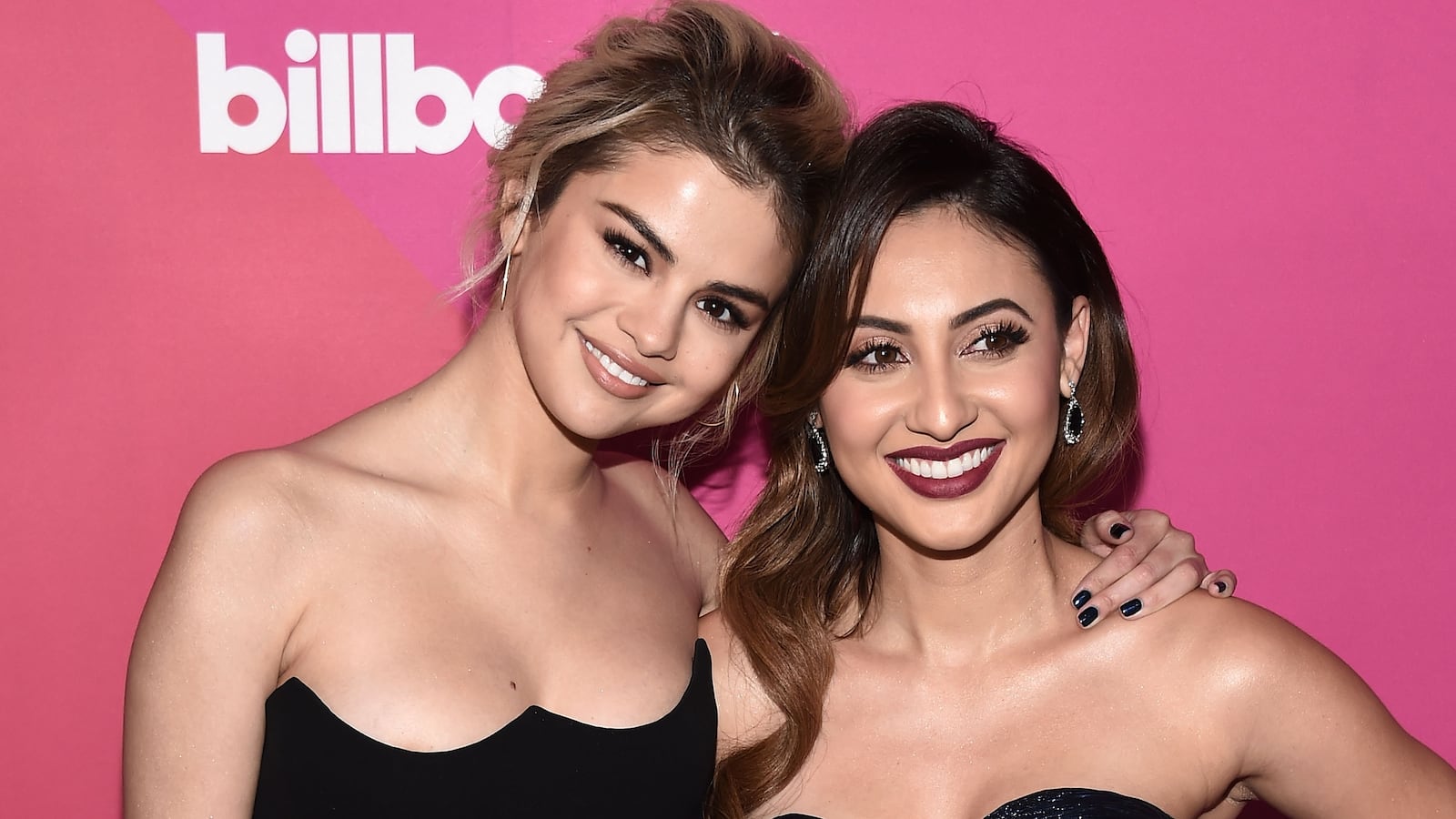 Singer Selena Gomez and actress Francia Raisa arrive at Billboard Women In Music 2017.