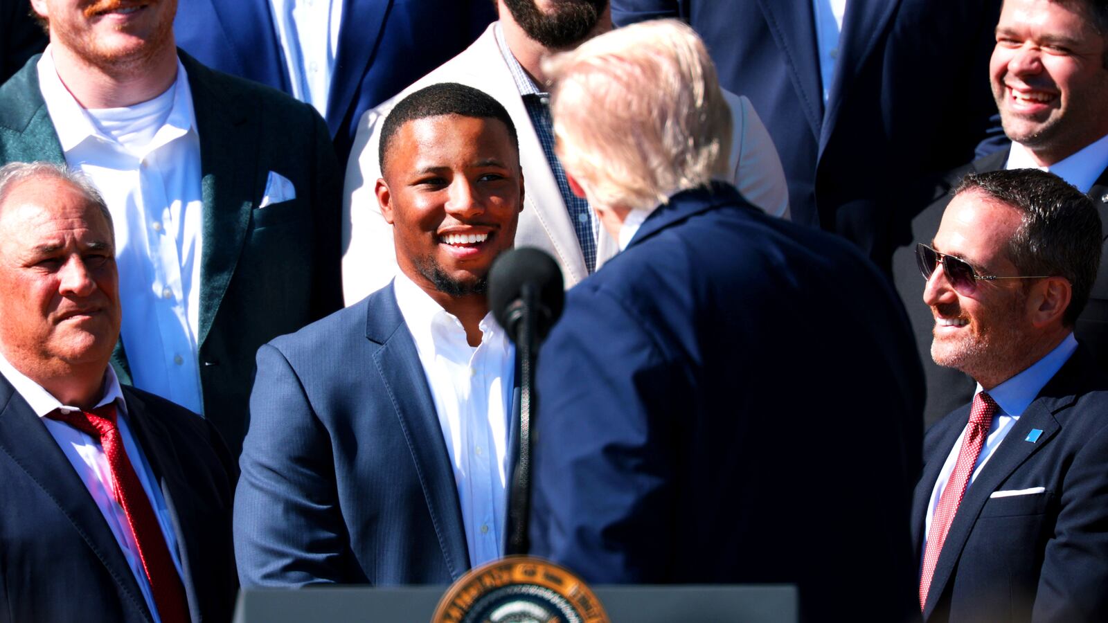 Saquon Barkley and Donald Trump