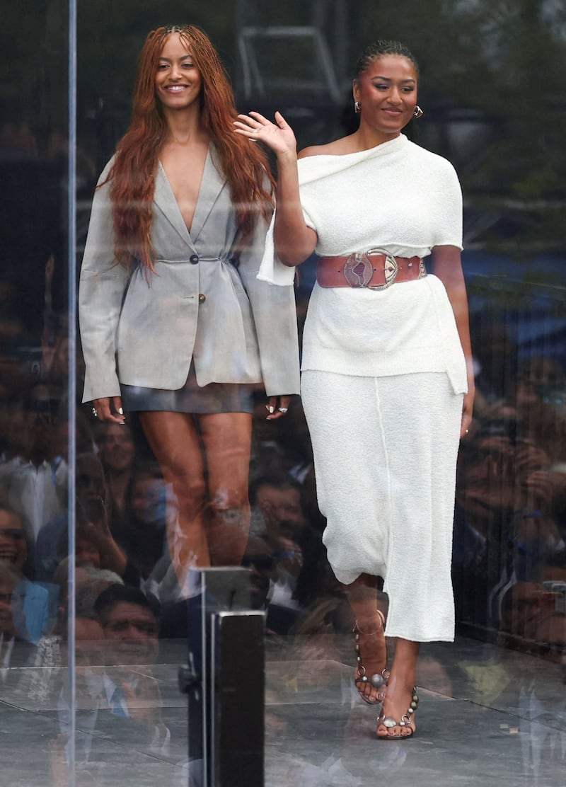 Malia and Sasha Obama enter Thursday’s ceremony.