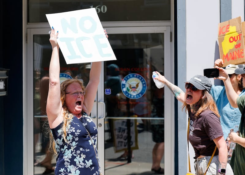 People protest outside the office of U.S. Senator Susan Collins (R-ME) after a shooting involving U.S. Immigration and Customs Enforcement (ICE) in Biddeford, Maine, U.S. July 13, 2026.  REUTERS/CJ Gunther