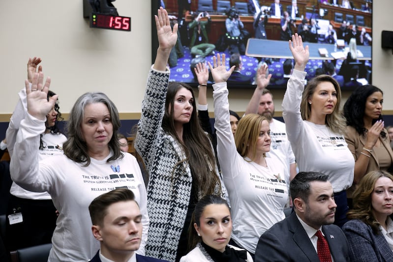 Jeffrey Epstein abuse survivors stand in the audience as Attorney General Pam Bondi was cornered over whether she would apologize for the Justice Department's handling of the release of files and failing to redact victims' names.