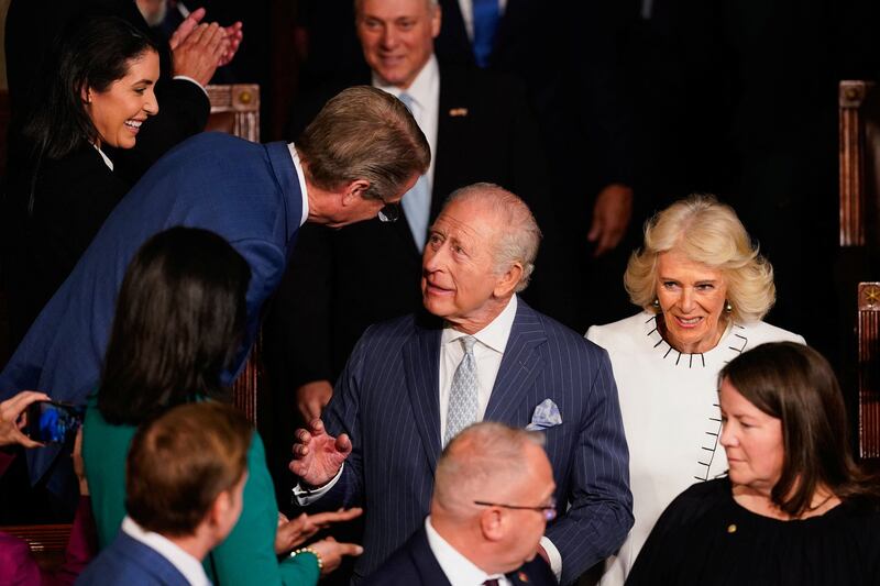 GOP Rep. Tim Burchett leans in to greet King Charles and Queen Camilla as Rep. Anna Paulina Luna looks on as Their Royal Highnesses arrive for a joint session of Congress in the House Chamber of the U.S. Capitol on April 28, 2026.