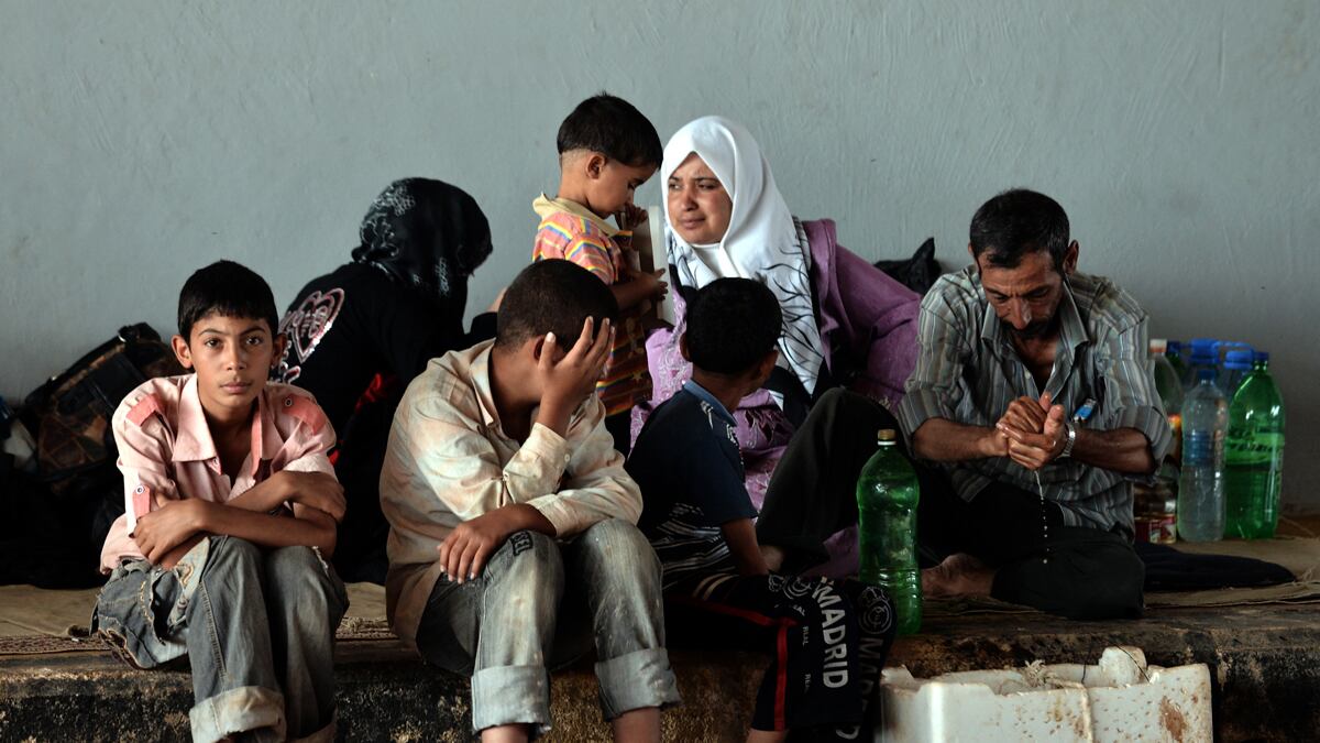 articles/2012/08/30/hostility-to-syrian-refugees-rising-along-turkey-s-border/syria-refugees-giglio_iyljvf