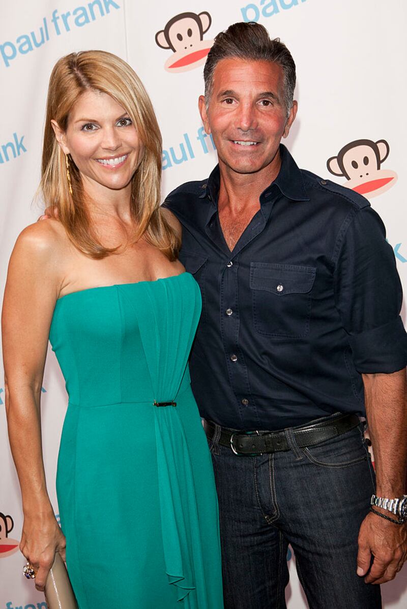 Lori Loughlin and Massimo attend Paul Frank's celebration of Fashion's Night Out at ADBD Gallery on September 8, 2011 in Los Angeles, California.  (Photo by Michael Bezjian/Getty Images for ADBD)