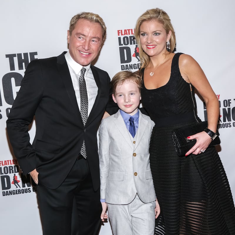 Dancer and choreographer Michael Flatley, his son Michael St. James Flatley, and his wife, Niamh O'Brien, attend the Broadway opening night of "Lord of the Dance: Dangerous Games" at the Lyric Theatre on November 10, 2015, in New York City.