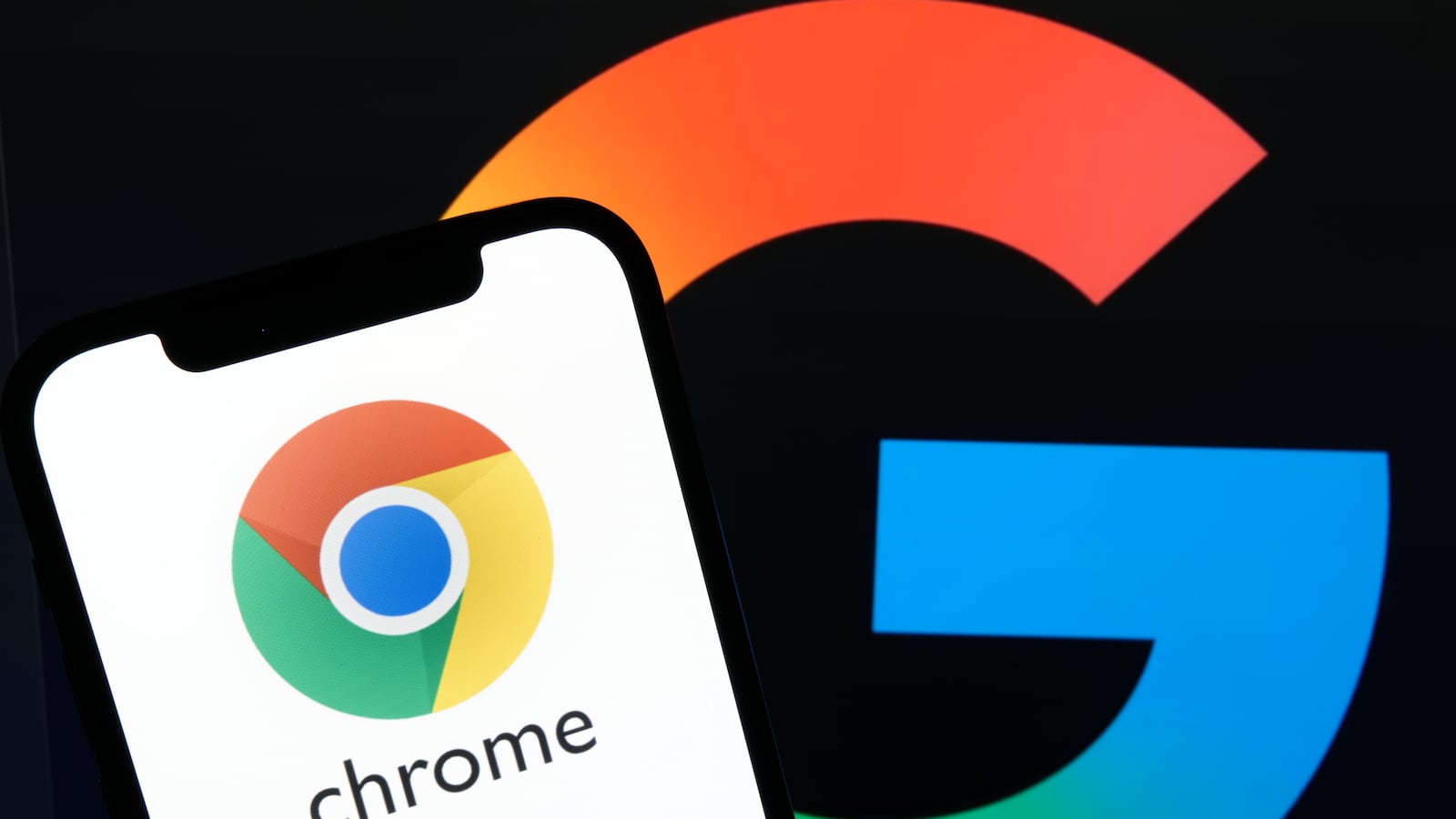 The Google Chrome app icon displays on a smartphone with the Google logo in the background in an editorial image. The image shows the Google Chrome and Perplexity AI application icons on a smartphone screen, with the colorful Google logo in the background. The composition emphasizes the presence of web browsing and AI-powered search tools within the technology ecosystem in City, Country, on August 14, 2025. (Photo by Matteo Della Torre/NurPhoto via Getty Images)