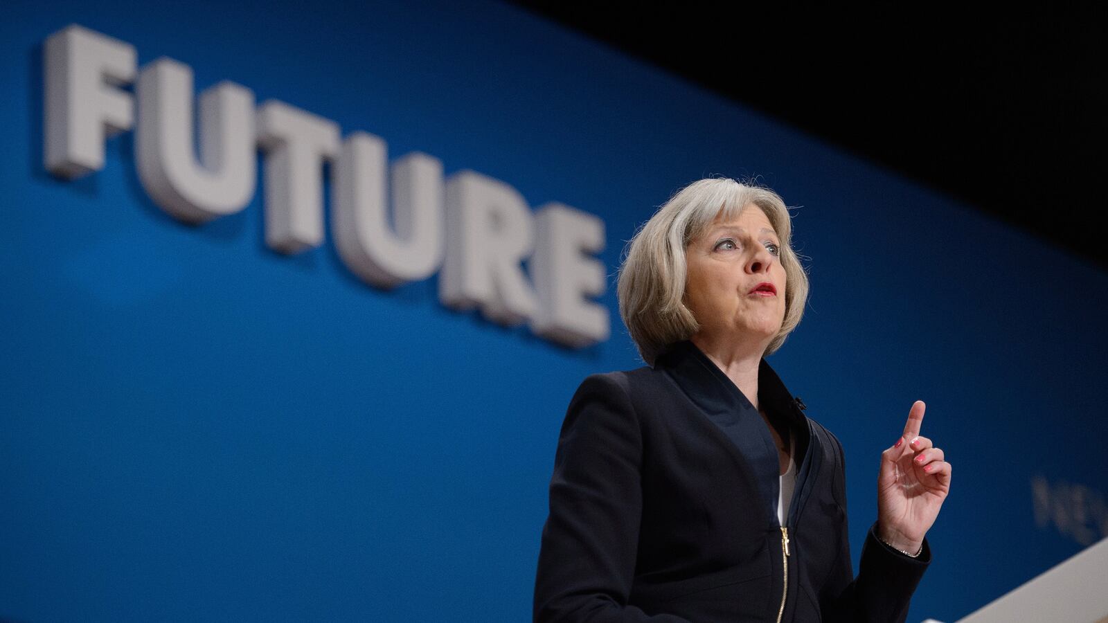 articles/2014/10/04/the-uk-s-new-iron-lady-in-kitten-heels/141003-Hines-Theresa-May-tease_ski1vb