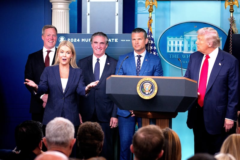 White House press secretary Karoline Leavitt (2nd-L) speaks after being asked to join U.S. President Donald Trump during a news conference
