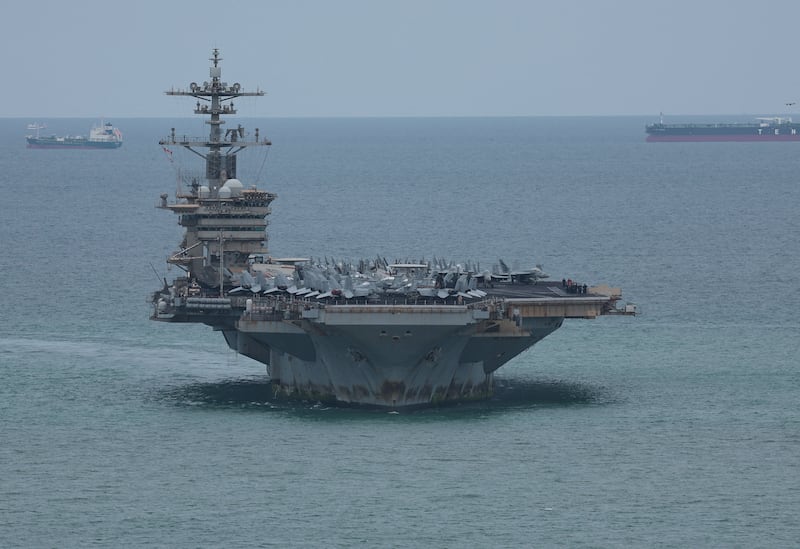 The U.S. Navy Nimitz-class aircraft carrier USS Abraham Lincoln sails toward Laem Chabang Port before docking for a rest stop following a long deployment in the Middle East, in Chonburi province, Thailand, September 2, 2026. REUTERS/Chalinee Thirasupa