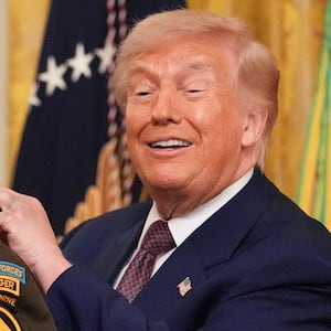 U.S. President Donald Trump awards retired U.S. Army Major Nicholas Dockery the Medal of Honor during a ceremony at the White House in Washington, D.C., U.S., June 18, 2026.