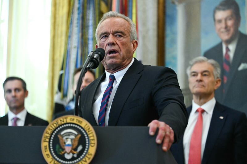 US Secretary of Health and Human Services Robert F. Kennedy Jr. speaks in the Oval Office during an event with President Donald Trump at the White House in Washington, DC on November 6, 2025. Trump announced deals Thursday with pharmaceutical giants Eli Lilly and Novo Nordisk to lower the prices of some popular weight-loss drugs. Both companies "have agreed to offer their most popular GLP-1 weight-loss drug," Trump said, "at drastic discounts." (Photo by ANDREW CABALLERO-REYNOLDS / AFP) (Photo by ANDREW CABALLERO-REYNOLDS/AFP via Getty Images)