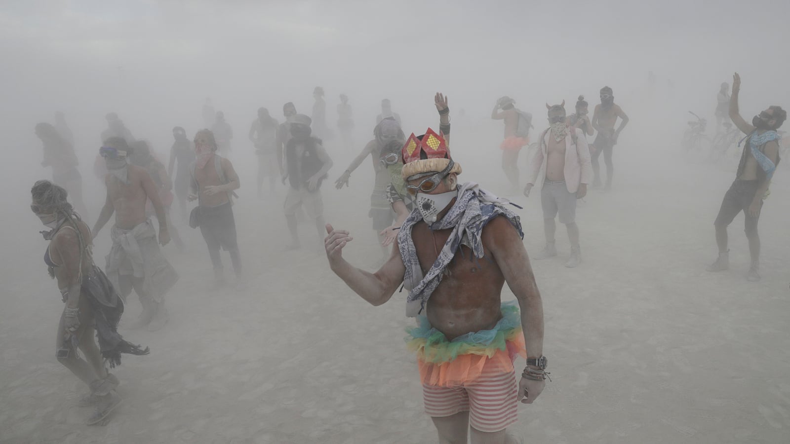 Burning Man attendees in 2017—a dense dust storm has held up participants leaving after the last day of Burning Man 2024.