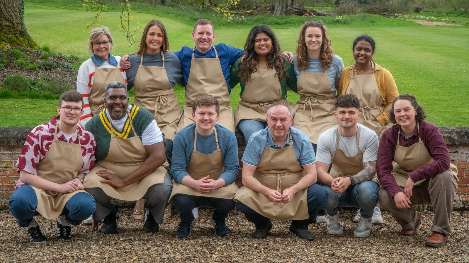 Photo of Rowan, Nicky, Amos, Cristy, Dan, Josh, Dana, Keith, Tasha, Matty, Saku, and Abbi on The Great British Baking Show