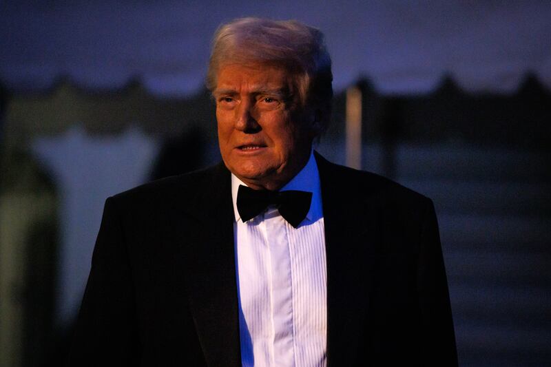 President Donald Trump walks over to speak with reporters before departing from the South Lawn of the White House in Marine One on September 20, 2025 in Washington, D.C.