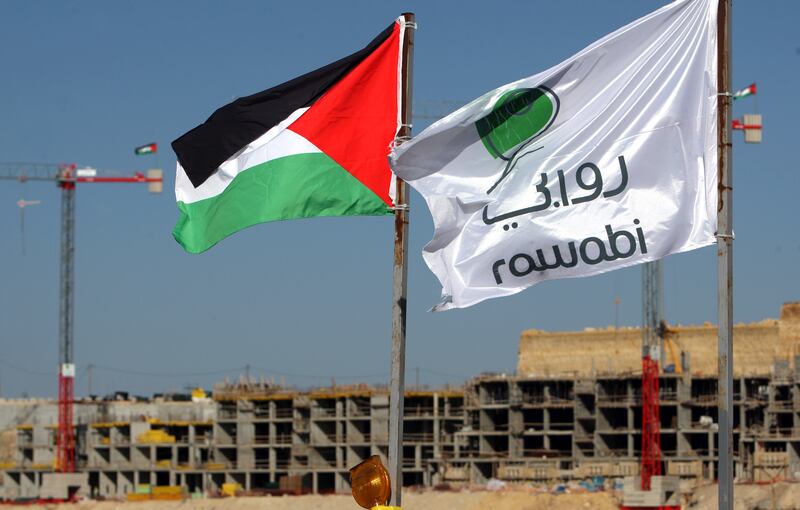 articles/2012/06/05/invest-in-palestine/rawabi_palestinian_flag_zh9bap