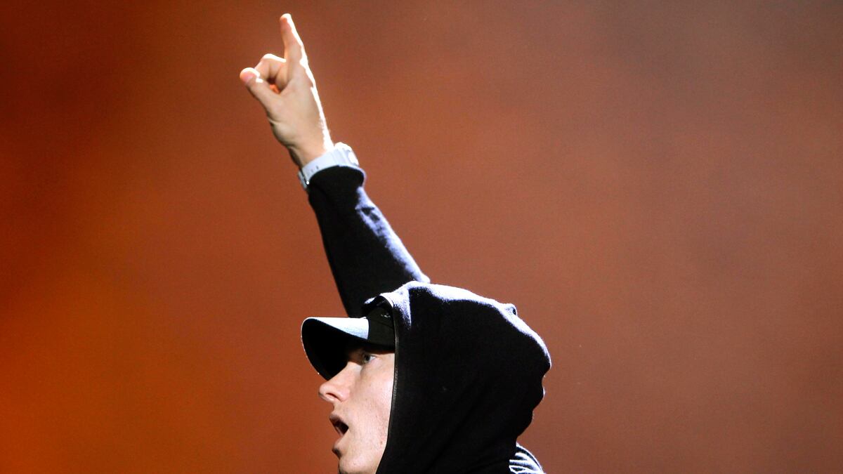 articles/2013/10/18/eminem-s-homophobic-rap-god-lyrics-are-getting-a-free-pass/131018-fallon-eminem-tease_ww3ifq