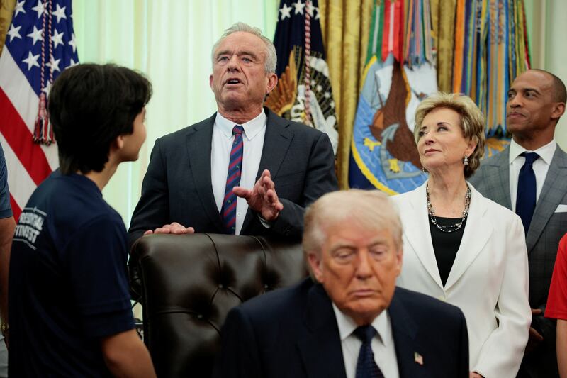 U.S. President Donald Trump, U.S. Health and Human Services (HHS) Secretary Robert F. Kennedy Jr and U.S. Department of Housing and Urban Development Secretary Scott Turner attend a memorandum signing event in the Oval Office at the White House in Washington, D.C., U.S., May 5, 2026. REUTERS/Evan Vucci