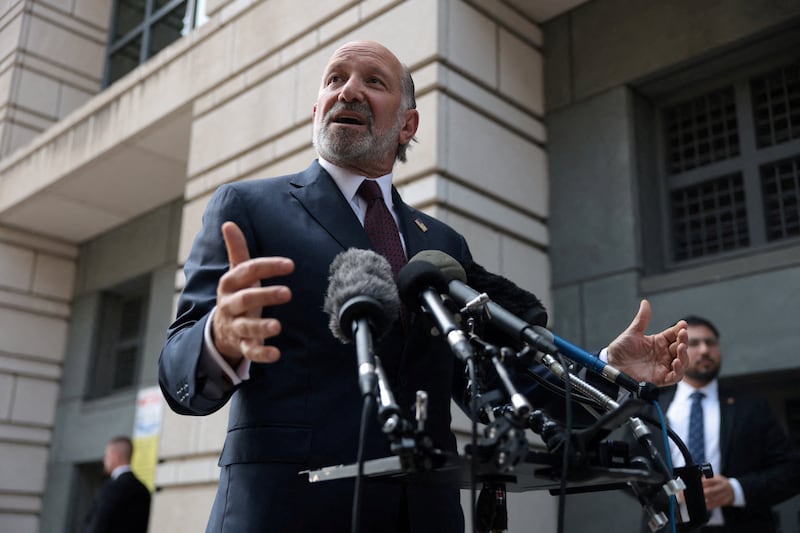 U.S. Secretary of Commerce Howard Lutnick speaks to the media outside the U.S. District Courthouse ahead of a hearing on a new legal challenge that seeks to block U.S. President Donald ‌Trump's name from being inscribed on the John F. Kennedy Center for the Performing Arts, in Washington, D.C., U.S., August 27, 2026. REUTERS/Evelyn Hockstein