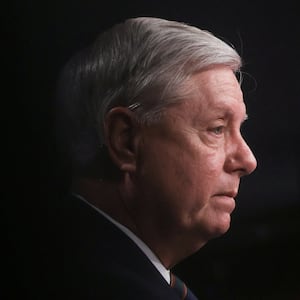 FILE PHOTO: U.S. Senator Lindsey Graham (R-SC) attends a news conference a day after supporters of U.S. President Donald Trump occupied the Capitol building, in Washington, U.S. January 7, 2021. REUTERS/Jonathan Ernst/File Photo