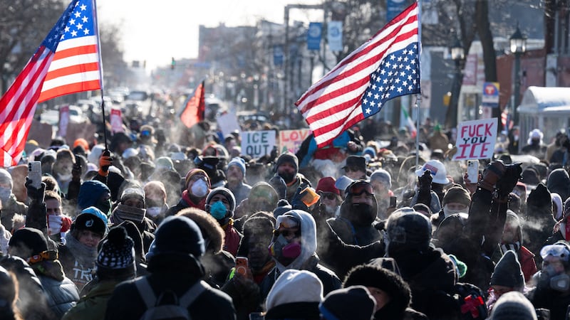 Protesters gather near where a man was shot dead by federal immigration agents in Minneapolis, Minnesota, on January 24, 2026.