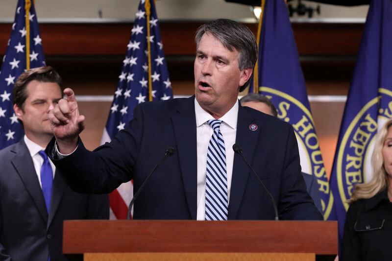 U.S. Representative Barry Moore (R-AL) speaks during a news conference where U.S. Representative Marjorie Taylor Greene (R-GA) introduced a resolution to investigate funding for Ukraine, on Capitol Hill in Washington, U.S., November 17, 2022. REUTERS/Amanda Andrade-Rhoades