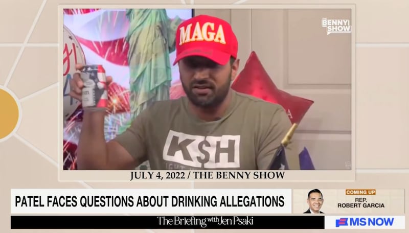 Kash Patel with a beer