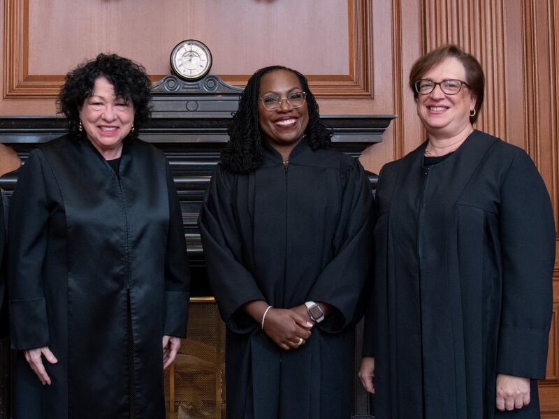 Sonia Sotomayor, Ketanji Brown Jackson, and Elena Kagan pose at a courtesy visit in the Justices Conference Room prior to the investiture ceremony of Associate Justice Ketanji Brown Jackson September 30, 2022 in Washington, DC.