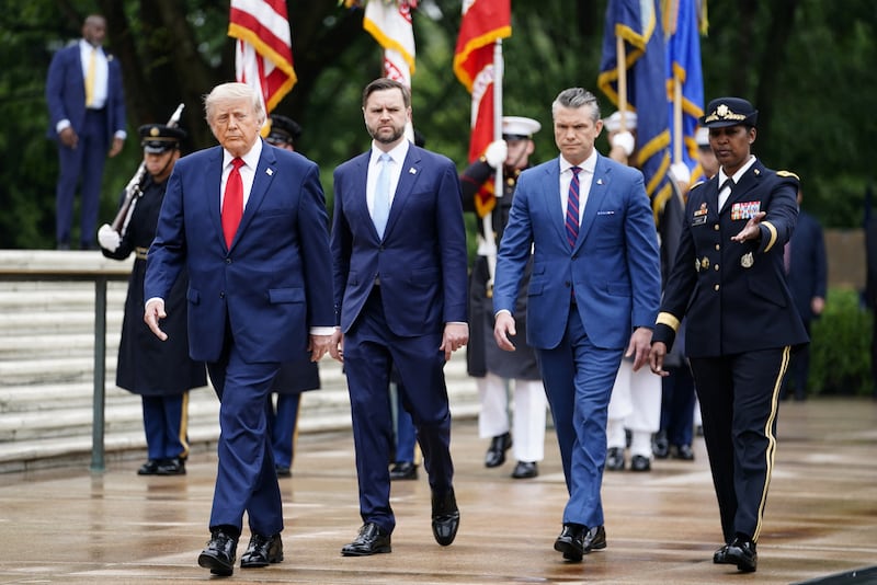 U.S. President Donald Trump, U.S. Vice President JD Vance and U.S. Secretary of Defense Pete Hegseth participate in a wreath-laying ceremony at the Tomb of the Unknown Soldier as part of a Memorial Day event at Arlington National Cemetery, Arlington, Virginia, U.S., May 25, 2026. REUTERS/Nathan Howard