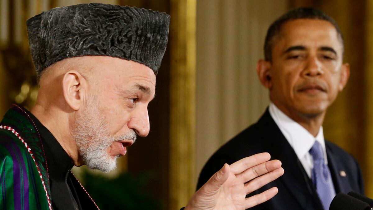 cheats/2013/12/23/u-s-warns-of-afghan-withdrawal/130111-karzai-obama-talk-cheat_umwijm