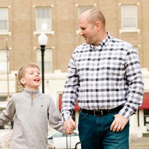 North Dakota State Senator Doug Larsen, his wife, Amy, and their two children.