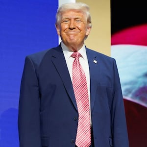 U.S. President Donald Trump smiles onstage before delivering remarks at the Future Investment Initiative (FII) Institute's summit at the Faena Forum in Miami Beach, Florida, U.S., March 27, 2026. REUTERS/Elizabeth Frantz