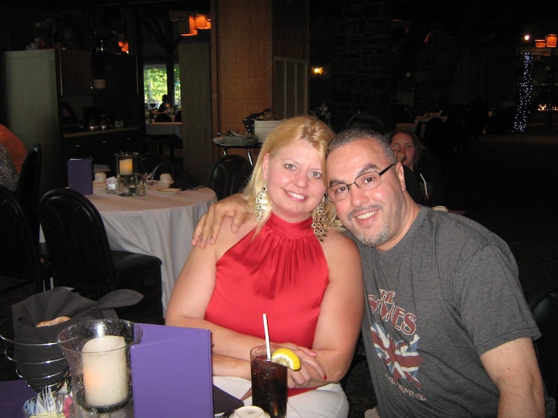Sandra and Abdellatif Hafraoui sat at a table.