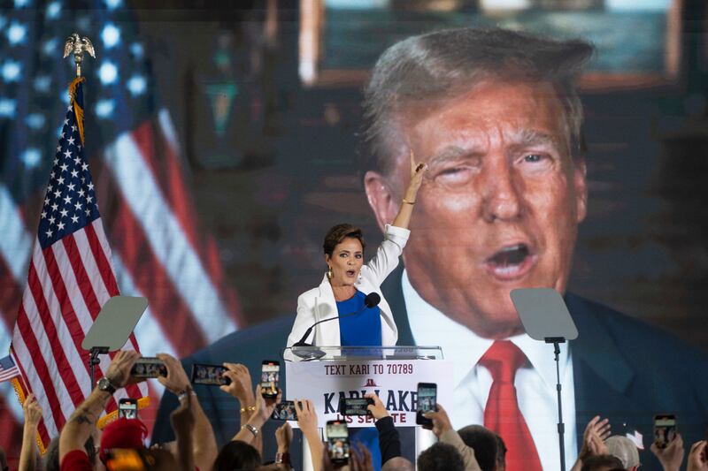 SCOTTSDALE, ARIZONA - OCTOBER 10: Former Arizona Republican gubernatorial candidate Kari Lake announces her bid for the seat of U.S. Sen. Kyrsten Sinema (I-AZ) at JetSet Magazine on October 10, 2023 in Scottsdale, Arizona. Former President Donald Trump gave his endorsement of Lake through a pre-recorded video during the rally. (Photo by Rebecca Noble/Getty Images)